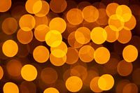 Bokeh van gouden feestlichtjes