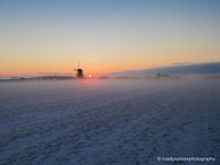 Mistige zonsopkomst
