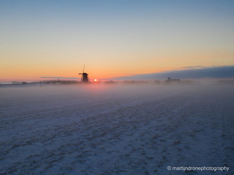 Mistige zonsopkomst van Martijn de Ruijter