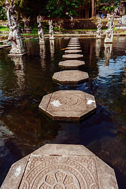 Stepping stones through the pond at Tirta Gangga