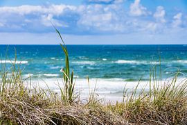View over dune with dune grass to stormy sea by Stefan Kreisköther
