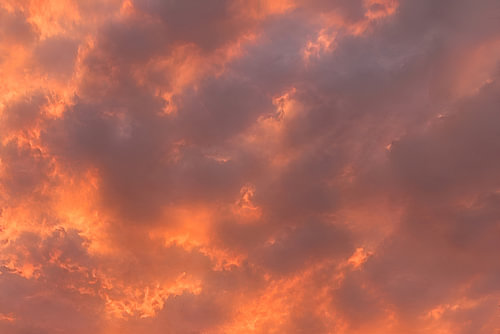 Warm clouds in orange and grey
