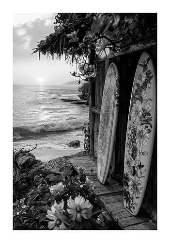 Idyllic beach at sunset with surfboard