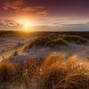 Wegtrekkende onweersbui tijdens zonsondergang in Kijkduin van Rob Kints