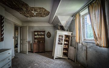 Room with cupboards with decay by Inge van den Brande