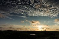 De ondergaande zon boven Texel van Jan Peter Mulder thumbnail