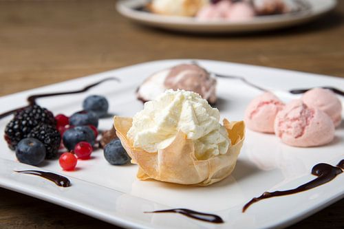 Dessert with ice cream and forest fruits