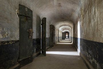 Corridor in abandoned prison by Roy Vereijken