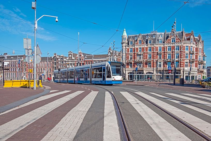 Driving tram at the Muntplein in Amsterdam by Eye on You