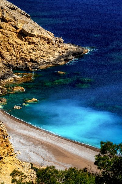 Lonely beach in Mallorca in dramatic light with blue turquoise water by Daniel Pahmeier