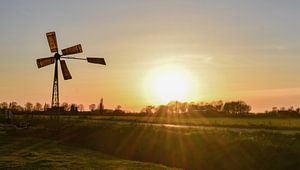 Zonsondergang polder landschap Nederland van Marjolein van Middelkoop