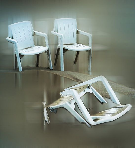 plastic chairs on the beach abstract by . Groningenart