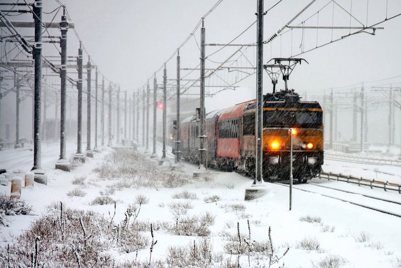 Train in blizzard near Amsterdam Central Station by Eye on You