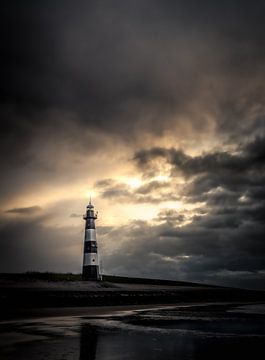 Lighthouse in the light by Hans Brasz