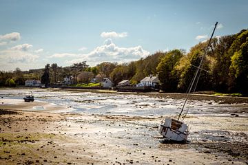 sailing boat at low tide by Julian Buijzen