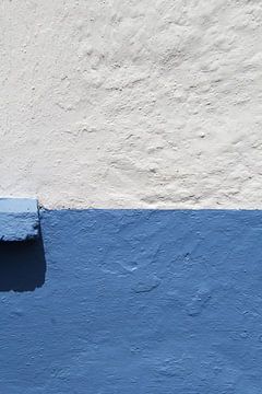 Blauwe en witte landhuismuur van Western Exposure