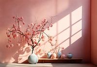 flower vase with branches with blossom and pastel-coloured vases in front of open window