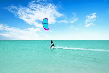 Kite surfing on Palm Beach on Aruba in the Caribbean Sea by Eye on You