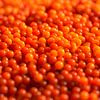 Perles orange sur Jörg Hausmann