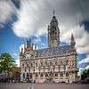 Middelburg town hall in Zeeland netherlands with beautiful clouds and people on the square by Bart Ros