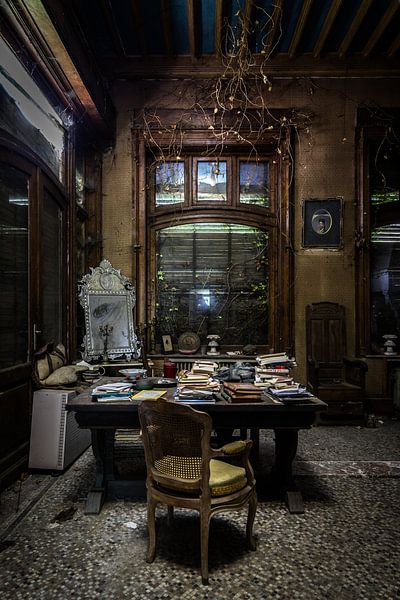 Office in dilapidated villa by Inge van den Brande