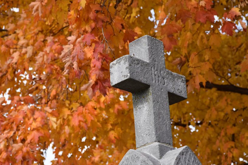 A cross in the cemetery in autumn by Claude Laprise