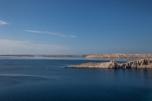 The silent guardian of the rocky cove.