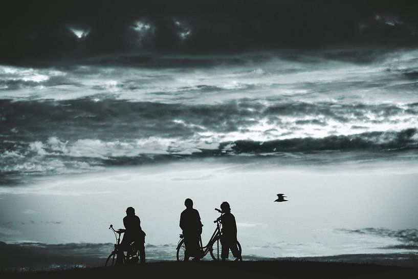 Ameland cycling boys sunset by . Groningenart
