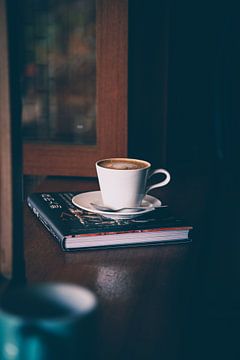 Cup on a book by Milan Markovic