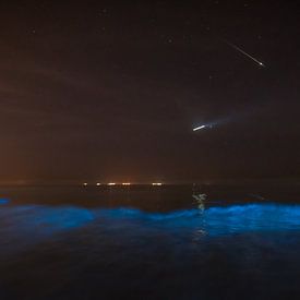 shooting star over sea sparkle by Sjon de Mol