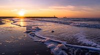 Sunset in the surf of Scheveningen