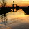 Moulin à vent hollandais au coucher du soleil ! sur Peter Haastrecht, van