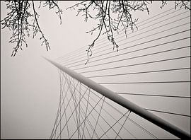 CALATRAVA BRUGGEN IN DE MIST by Fons Bitter