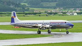 Red Bull Douglas DC-6B. by Jaap van den Berg