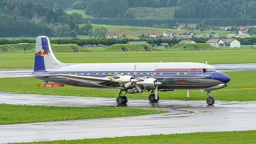 Red Bull Douglas DC-6B. by Jaap van den Berg