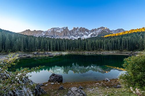 Panorama of Lake Karersee in the Dolomites in the early morning light