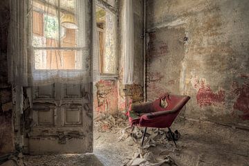 Abandoned place - red armchair