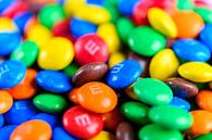 Colorful M&M candy coated button shaped milk chocolates by Sjoerd van der Wal Photography thumbnail