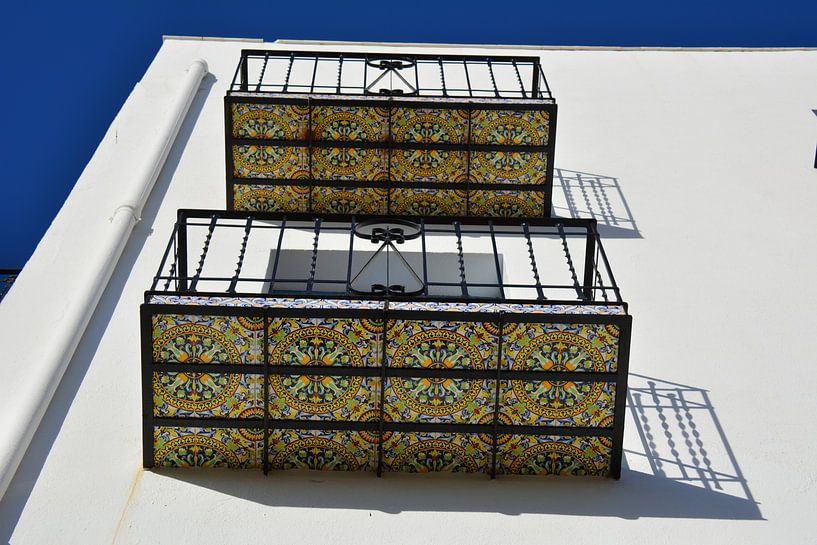 Colourful Portuguese Balconies with azulejos by My Footprints