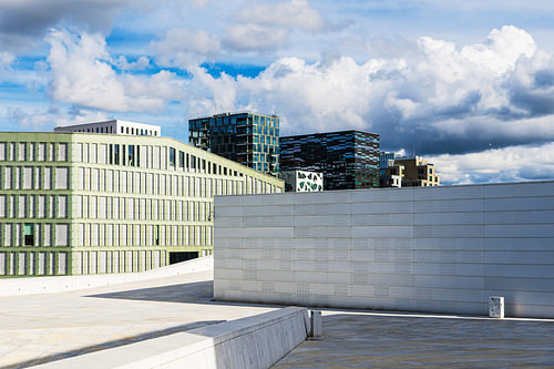 A view of modern buildings and clouds in Oslo, Norway