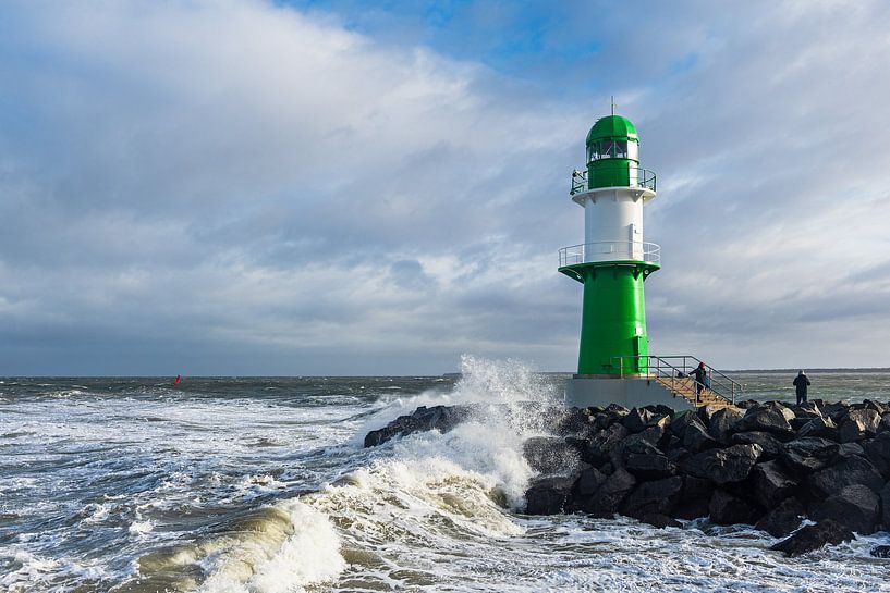 The pier on the Baltic coast in Warnemünde on a stormy day. by Rico Ködder