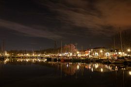 Water and Light: Enkhuizen's Night Charm by Rik Brussel