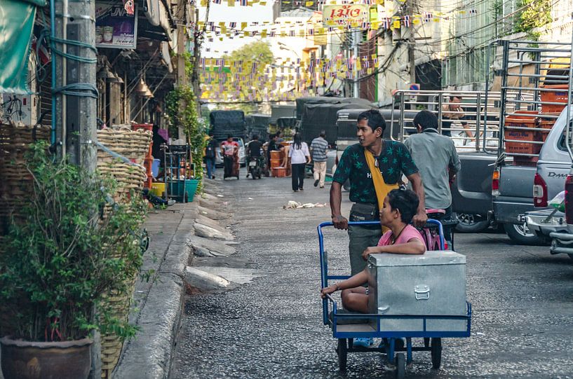 Locals buying food on the market by Stephan Smit