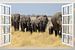 Een adembenemend uitzicht op langslopende olifanten van Bert Hooijer