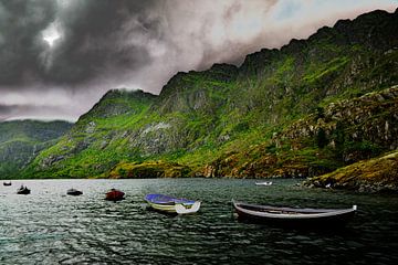 Dramatic rain clouds over lake with boats