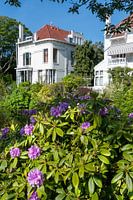 White house with rhododendron