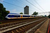 Het Nederlandse spoor met trein bij Utrecht van Kaj Hendriks thumbnail