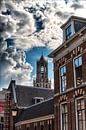 Donkere wolken bedreigen de Utrechtse Domtoren. van Margreet van Beusichem thumbnail