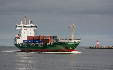 Container ship past the piers to the port of Amsterdam. by scheepskijkerhavenfotografie