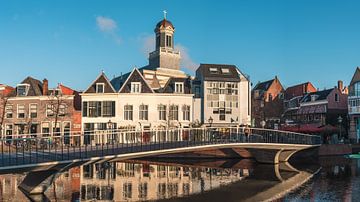 Beautiful picture of Leiden with the Hartebrug church in the background and a nice clear blue sky